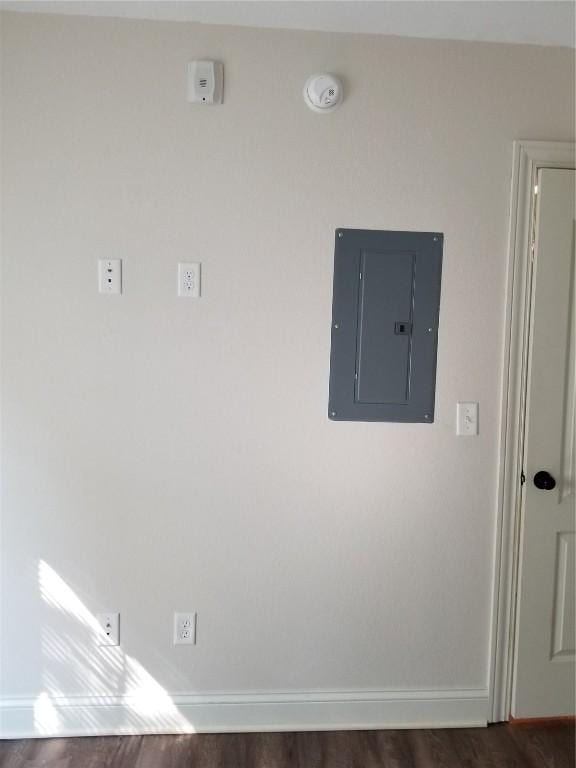100 Granview Ct Unit 126, Iowa City, IA 52246 - detailed view of electric panel, wood finished floors, baseboards, and a smoke detector