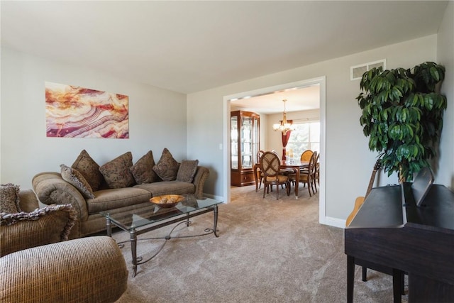 3010 Newcastle Rd, Marion, IA 52302 - living room with a chandelier, carpet floors, and baseboards