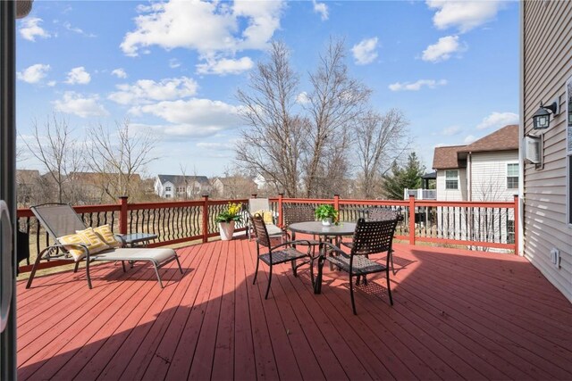 3010 Newcastle Rd, Marion, IA 52302 - wooden deck with outdoor dining area