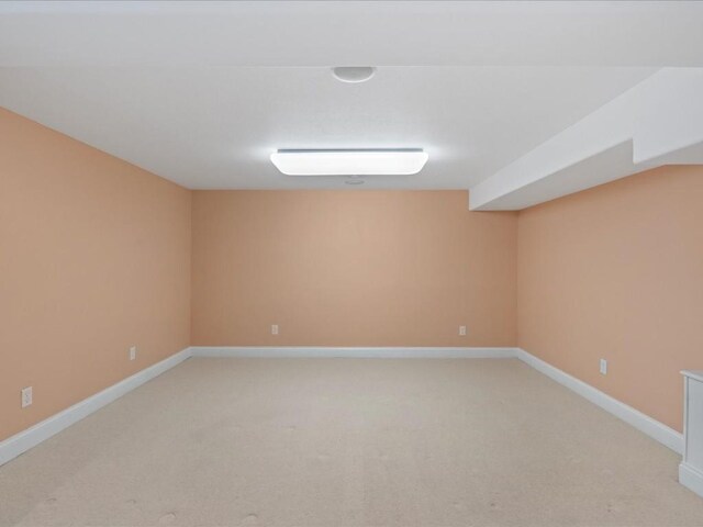 3010 Newcastle Rd, Marion, IA 52302 - unfurnished room with light carpet and baseboards