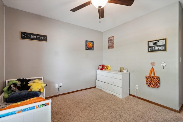 4708 Pueblo St SW, Cedar Rapids, IA 52404 - bedroom with carpet flooring, baseboards, and ceiling fan