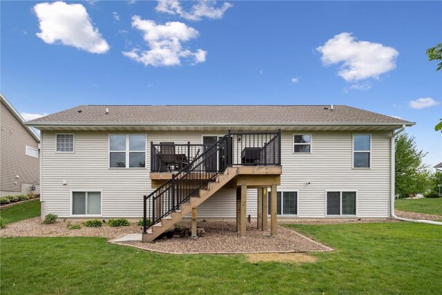 4708 Pueblo St SW, Cedar Rapids, IA 52404 - back of house with stairway, a wooden deck, a yard, and roof with shingles