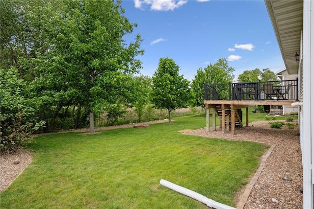4708 Pueblo St SW, Cedar Rapids, IA 52404 - view of green lawn featuring a deck
