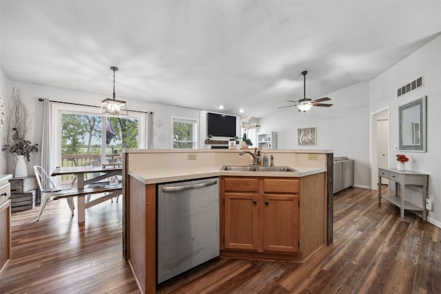 1500 Rock Island Dr, Ely, IA 52227 - kitchen featuring stainless steel dishwasher, a sink, healthy amount of natural light, light countertops, and lofted ceiling