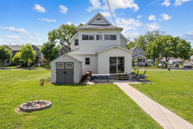1337 Ellis Blvd NW, Cedar Rapids, IA 52405 - rear view of house with a patio, a yard, a fire pit, and entry steps