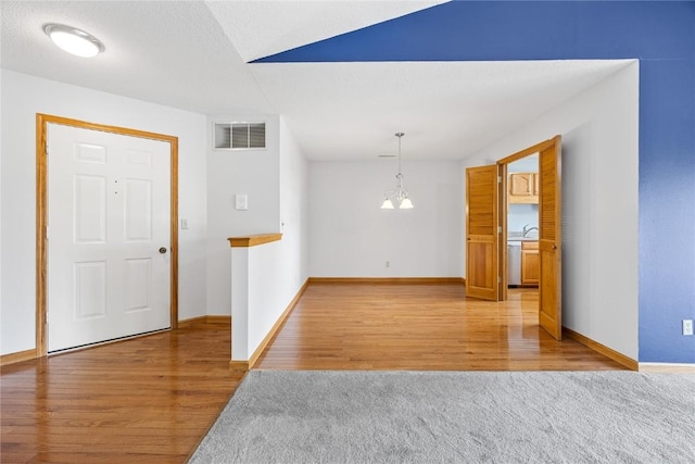 3110 Towne House Dr NE Unit C, Cedar Rapids, IA 52402 - unfurnished room featuring light wood-style flooring and baseboards