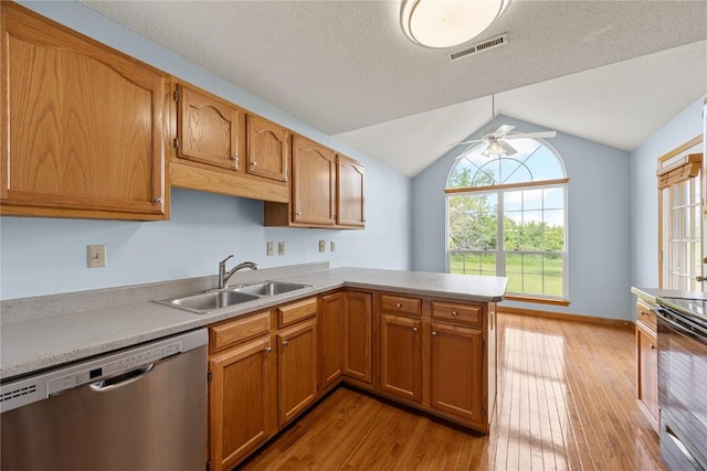 3110 Towne House Dr NE Unit C, Cedar Rapids, IA 52402 - kitchen featuring a sink, stainless steel dishwasher, light wood-type flooring, black electric range oven, and a ceiling fan