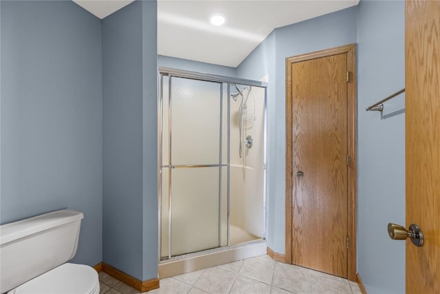 3110 Towne House Dr NE Unit C, Cedar Rapids, IA 52402 - full bathroom with toilet, a shower stall, baseboards, and tile patterned flooring