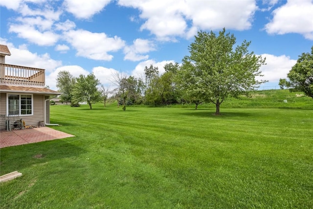 3110 Towne House Dr NE Unit C, Cedar Rapids, IA 52402 - view of grassy yard featuring a patio area