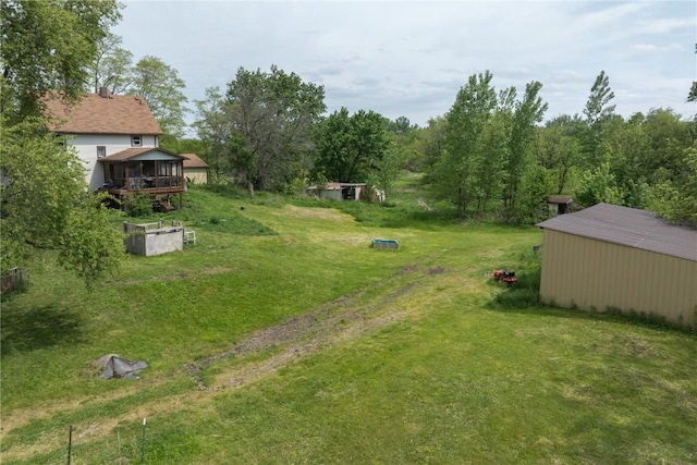 3136 155th St, Muscatine, IA 52761 - view of grassy yard featuring an outdoor structure