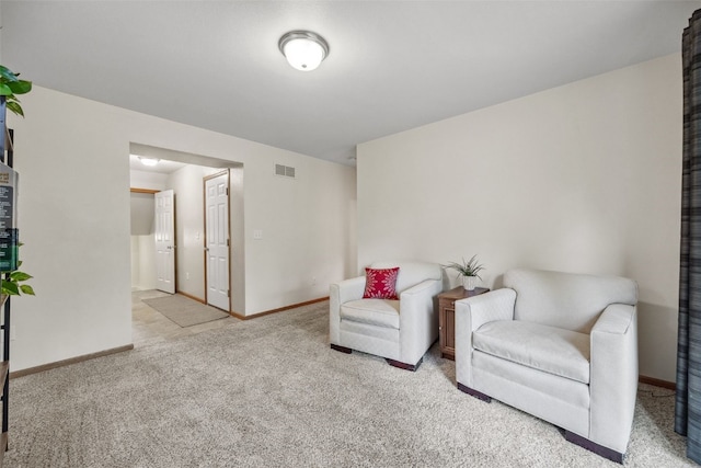 1075 Twilight Dr, North Liberty, IA 52317 - living area featuring carpet and baseboards