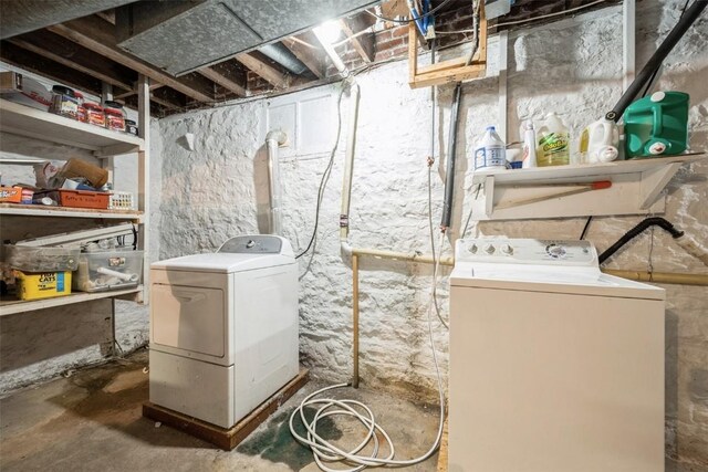 205 2nd Ave, Atkins, IA 52206 - unfinished below grade area featuring washing machine and dryer