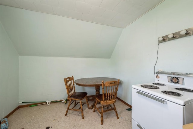 205 2nd Ave, Atkins, IA 52206 - dining space featuring vaulted ceiling and baseboards