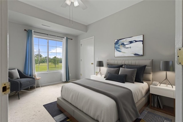250 Cimarron Unit 311, Hiawatha, IA 52233 - bedroom with carpet, baseboards, and a ceiling fan