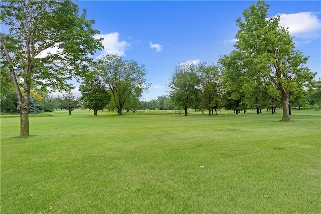 250 Cimarron Unit 311, Hiawatha, IA 52233 - view of home's community with a lawn