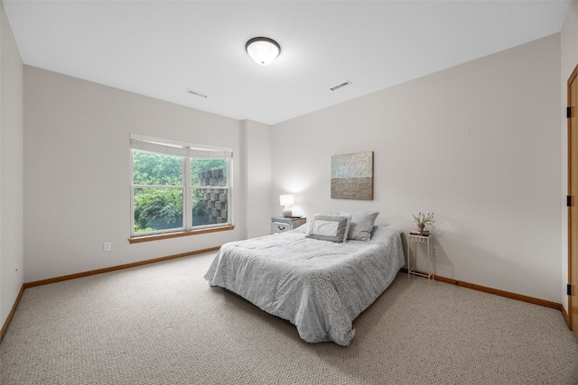 959 Tamarack Trl, Iowa City, IA 52245 - carpeted bedroom featuring baseboards