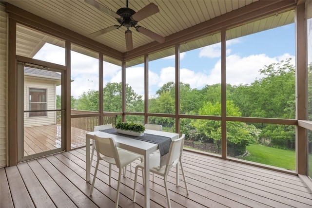 959 Tamarack Trl, Iowa City, IA 52245 - sunroom / solarium with ceiling fan and outdoor dining area