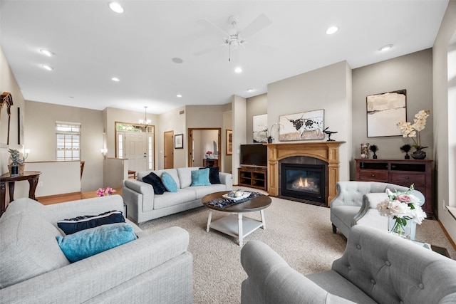 959 Tamarack Trl, Iowa City, IA 52245 - living area with a fireplace with flush hearth, ceiling fan, recessed lighting, carpet floors, and baseboards