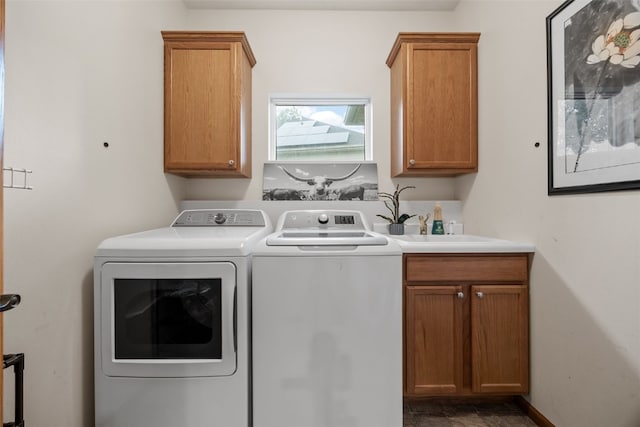 959 Tamarack Trl, Iowa City, IA 52245 - laundry area featuring separate washer and dryer and cabinet space