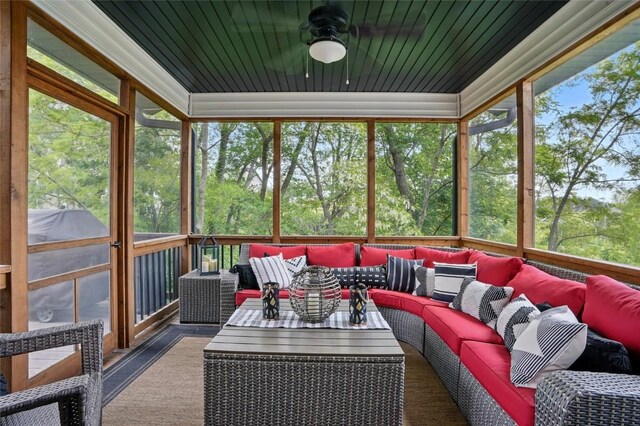 2925 Pine Hill Trce, Coralville, IA 52241 - sunroom featuring an outdoor hangout area, a ceiling fan, and plenty of natural light