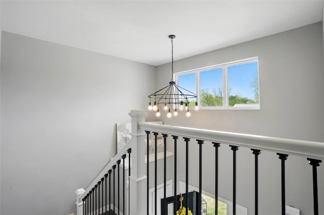 2925 Pine Hill Trce, Coralville, IA 52241 - staircase with a chandelier and healthy amount of natural light