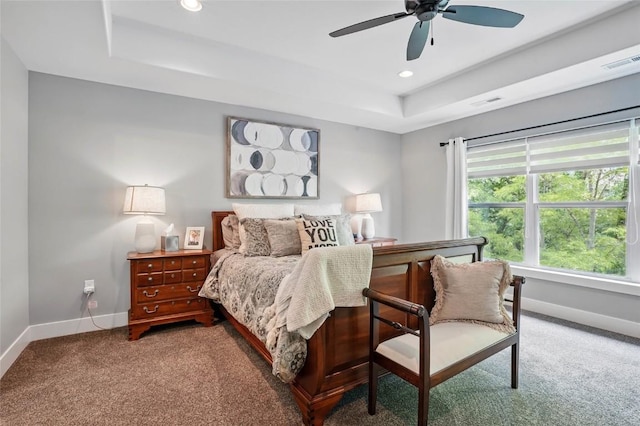 2925 Pine Hill Trce, Coralville, IA 52241 - bedroom with baseboards, a raised ceiling, light carpet, recessed lighting, and a ceiling fan