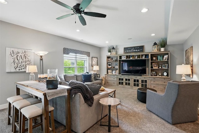 2925 Pine Hill Trce, Coralville, IA 52241 - living area featuring carpet floors, a ceiling fan, and recessed lighting