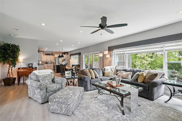 2925 Pine Hill Trce, Coralville, IA 52241 - living area with a ceiling fan, recessed lighting, and light wood-style flooring