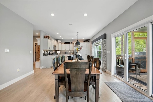 2925 Pine Hill Trce, Coralville, IA 52241 - dining room with baseboards, recessed lighting, and light wood-style floors