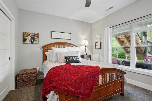 2925 Pine Hill Trce, Coralville, IA 52241 - carpeted bedroom featuring a ceiling fan and baseboards