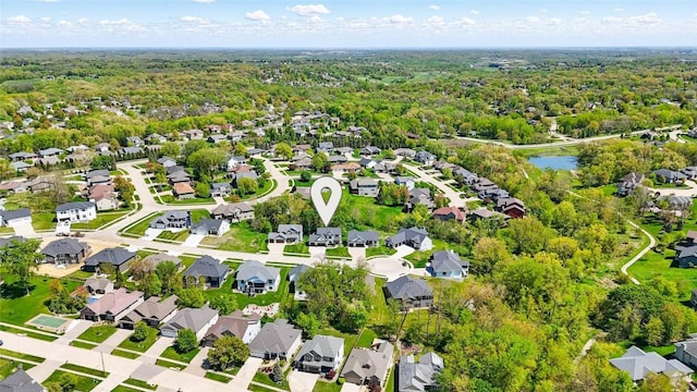 2925 Pine Hill Trce, Coralville, IA 52241 - aerial overview of property's location with a forest and nearby suburban area