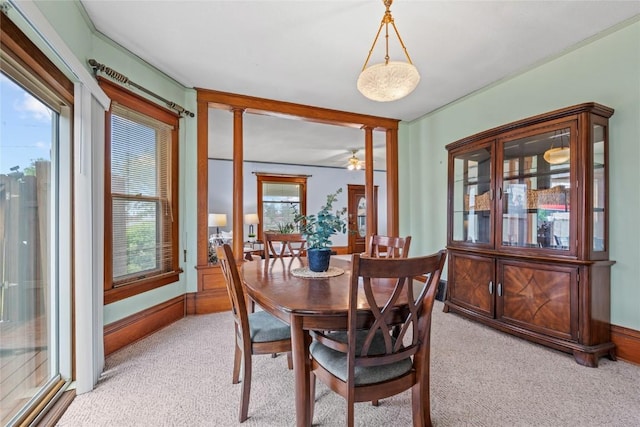 100 E Welsh St, Williamsburg, IA 52361 - dining space featuring light carpet and a ceiling fan