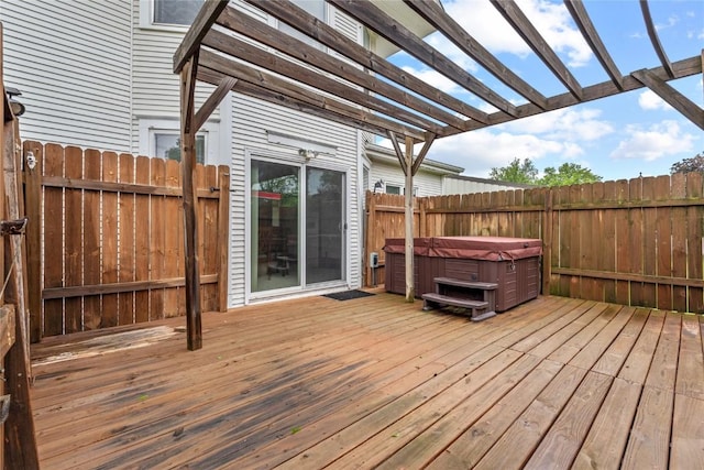 100 E Welsh St, Williamsburg, IA 52361 - deck with a hot tub and a pergola