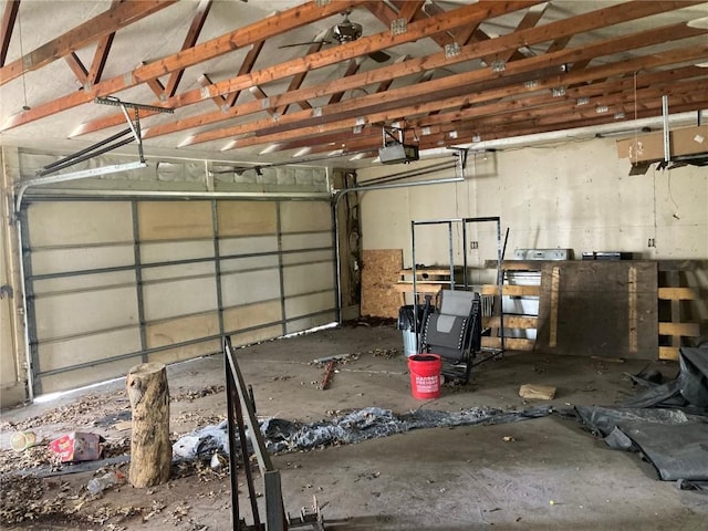1403 W 3rd St, Vinton, IA 52349 - garage featuring a garage door opener