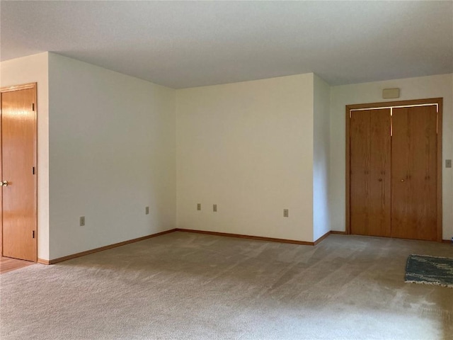 202 S 9th Ave, Vinton, IA 52349 - unfurnished bedroom with carpet flooring and baseboards