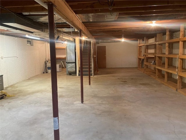 202 S 9th Ave, Vinton, IA 52349 - unfinished basement with brick wall
