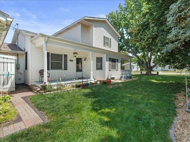 433 S Iowa St, Solon, IA 52333 - view of front of property with covered porch and a front lawn