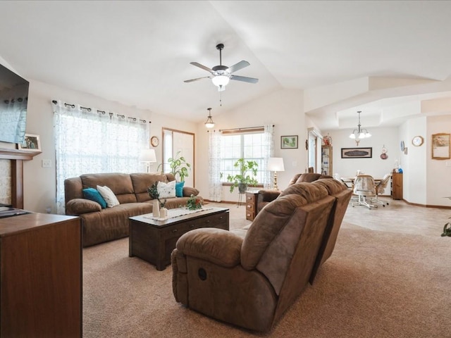 4408 Hastings Dr, Marion, IA 52302 - living room featuring a chandelier, vaulted ceiling, light colored carpet, and ceiling fan