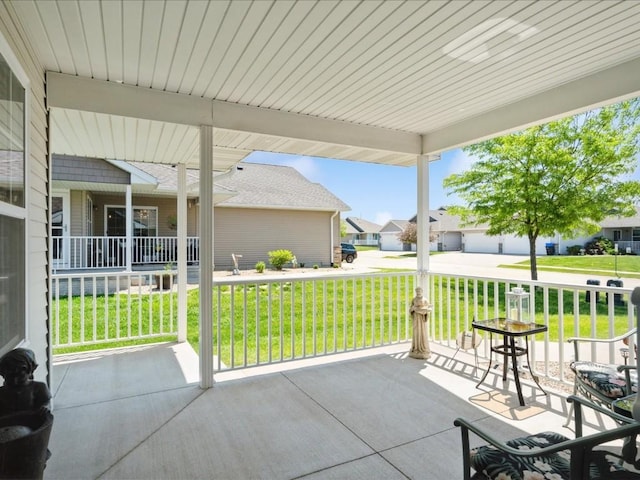 4408 Hastings Dr, Marion, IA 52302 - porch featuring a lawn and a residential view