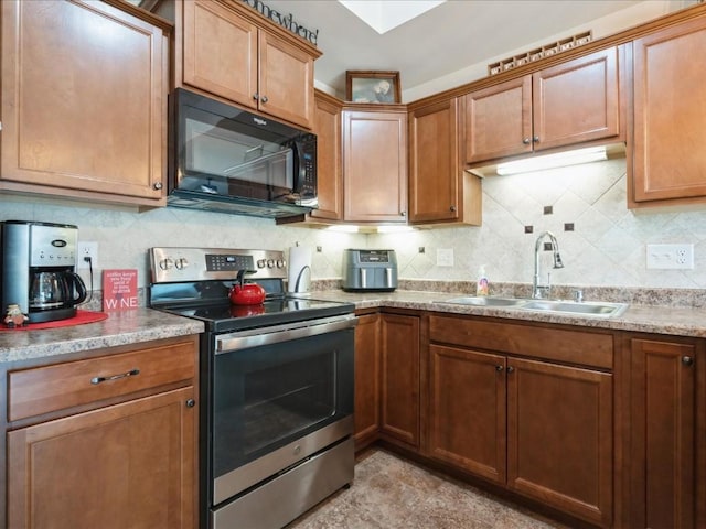 4408 Hastings Dr, Marion, IA 52302 - kitchen with black microwave, stainless steel electric stove, a sink, backsplash, and brown cabinets