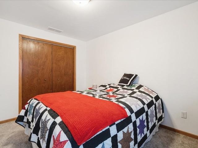 4408 Hastings Dr, Marion, IA 52302 - bedroom featuring carpet, baseboards, and a closet