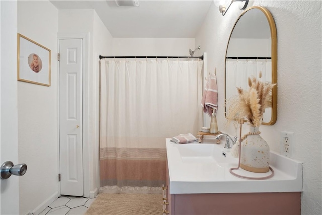 3007 Ravenwood Ter NW, Cedar Rapids, IA 52405 - bathroom featuring vanity and curtained shower