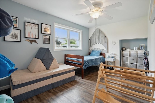 3007 Ravenwood Ter NW, Cedar Rapids, IA 52405 - bedroom featuring wood finished floors and a ceiling fan