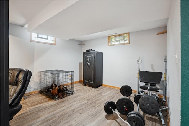 3007 Ravenwood Ter NW, Cedar Rapids, IA 52405 - workout room featuring wood finished floors and baseboards