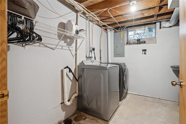 3007 Ravenwood Ter NW, Cedar Rapids, IA 52405 - laundry room featuring washer and dryer and electric panel