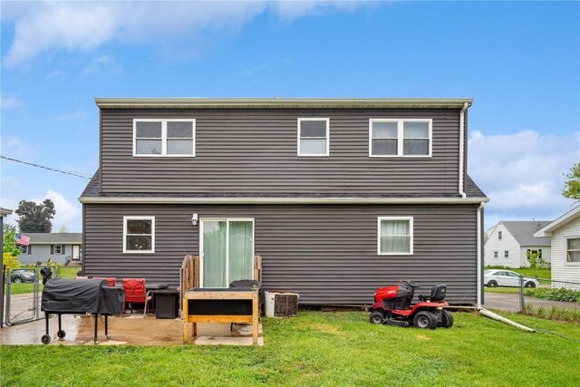 3007 Ravenwood Ter NW, Cedar Rapids, IA 52405 - back of property with a patio, a gate, and central AC unit