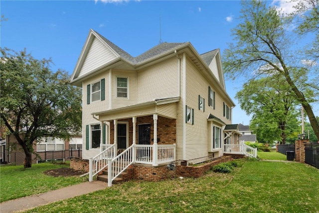 205 S Ford St, Anamosa, IA 52205 - view of front of house with a porch