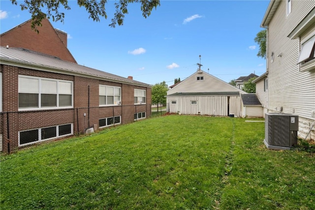 205 S Ford St, Anamosa, IA 52205 - view of green lawn featuring cooling unit