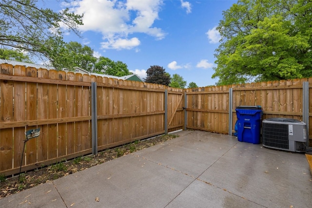 3051 Wayne Ave Unit 64, Iowa City, IA 52240 - fenced backyard with central AC and a patio area