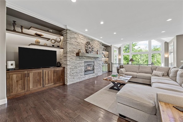 6712 Spring Grove Ct NE, Cedar Rapids, IA 52411 - living room with a fireplace, recessed lighting, ornamental molding, dark wood finished floors, and lofted ceiling